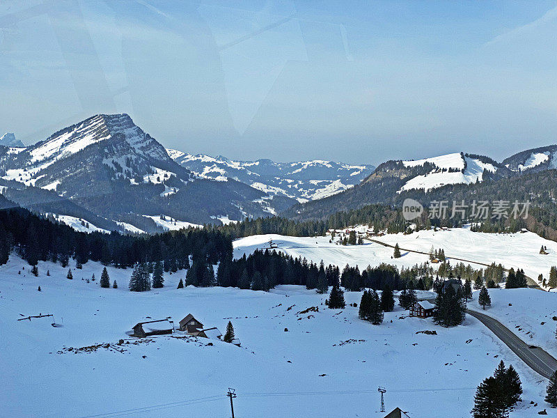 Snow-covered high alpine pastures and coniferous forests in the area of the Schwägalp mountain pass in the Appenzell Alps massif - Canton of Appenzell, Switzerland (Schweiz)